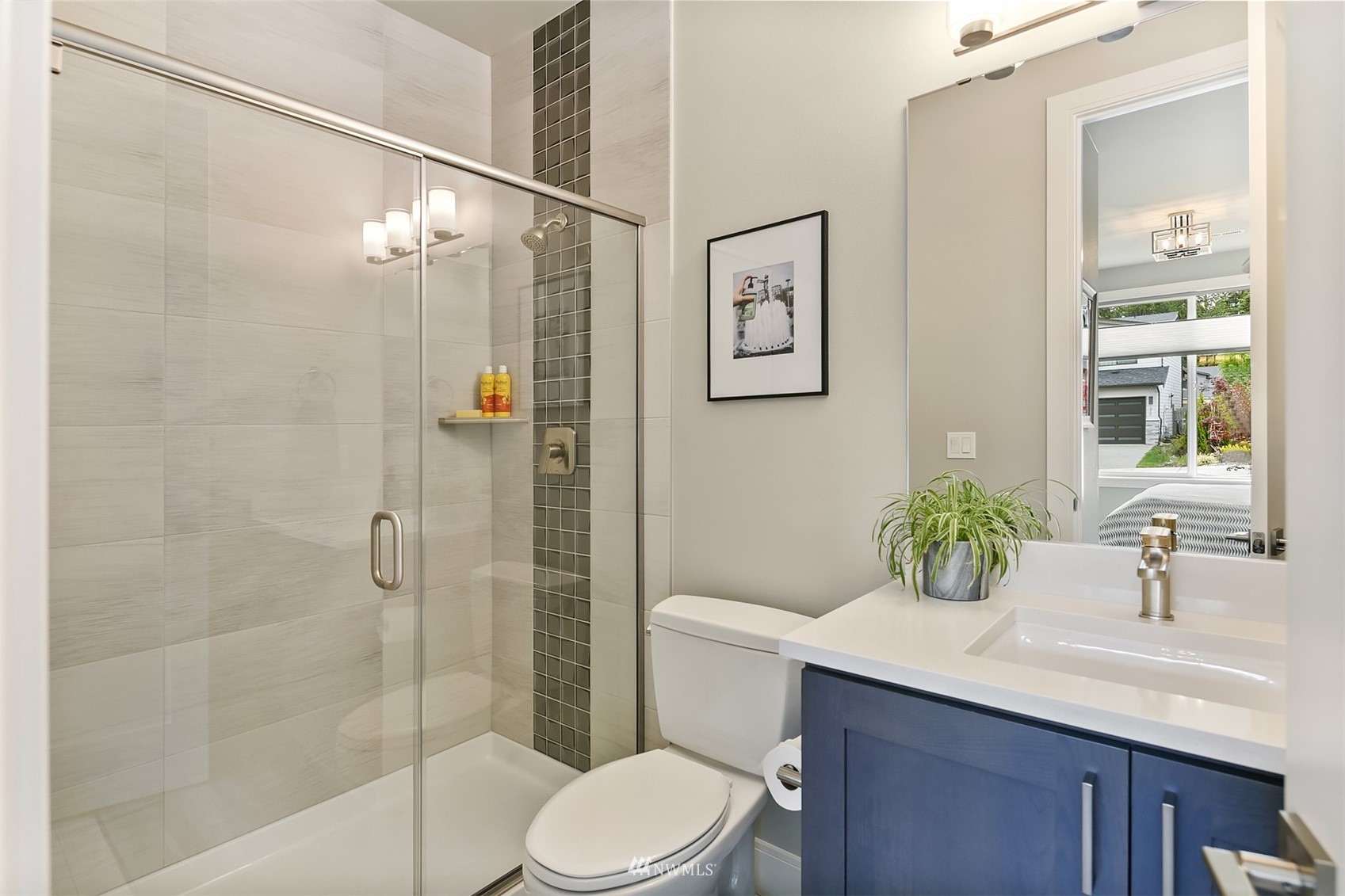 236 234th Place Southeast Bothell, WA 98021 - Photo 9 of 39 a bathroom with a sink a toilet and shower
