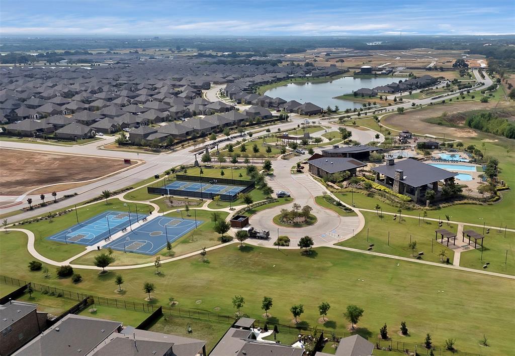 10401 Table Blf Street Aubrey, TX 76227 - Photo 22 of 25 an aerial view of residential houses with outdoor space