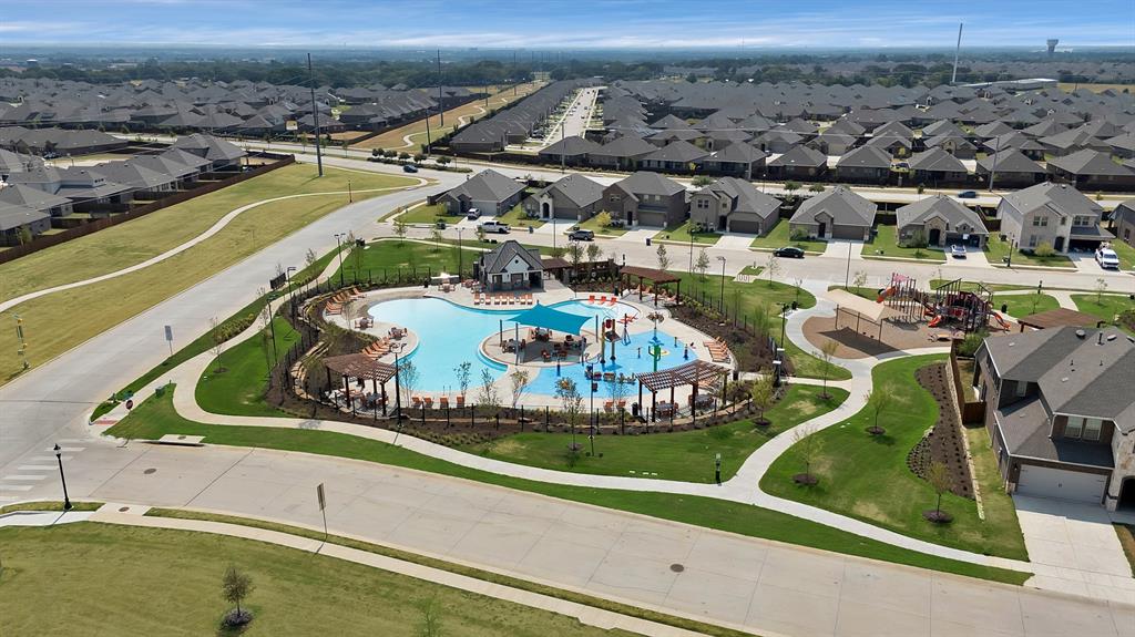 10401 Table Blf Street Aubrey, TX 76227 - Photo 24 of 25 an aerial view of a house with a garden and lake view
