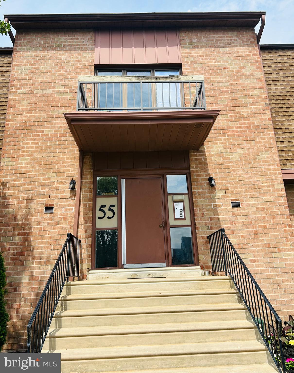 55301 Delaire Landing Road, Unit 301 Philadelphia, PA 19114 - Photo 3 of 7 a view of a brick house with wooden floor and stairs