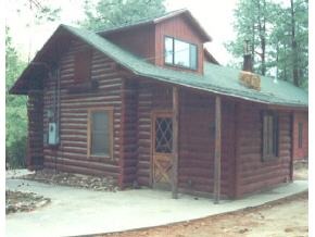922 East Friendly Pines Road Prescott, AZ 86303 - Photo 3 of 9 a front view of a house with a garden