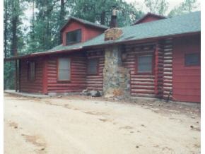 922 East Friendly Pines Road Prescott, AZ 86303 - Photo 5 of 9 a view of a house with a yard