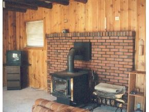 922 East Friendly Pines Road Prescott, AZ 86303 - Photo 9 of 9 a view of a balcony with chairs and a stove