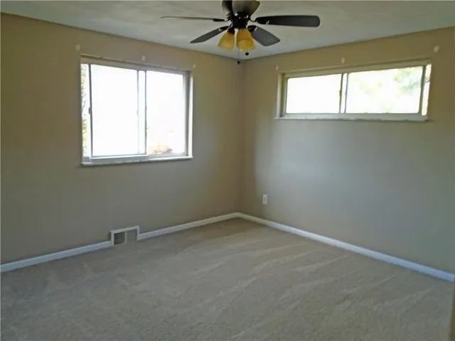 an empty room with a window