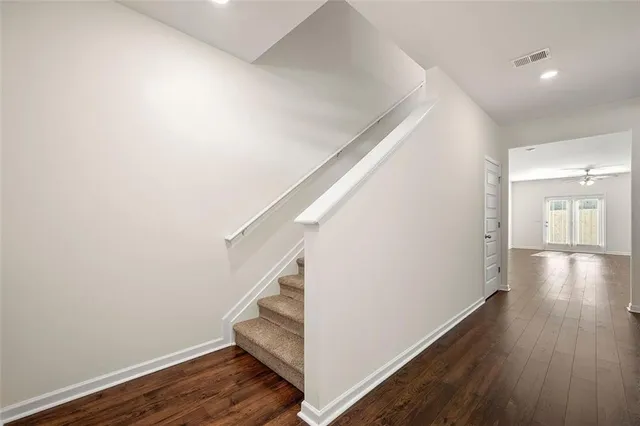 a view of entryway with wooden floor