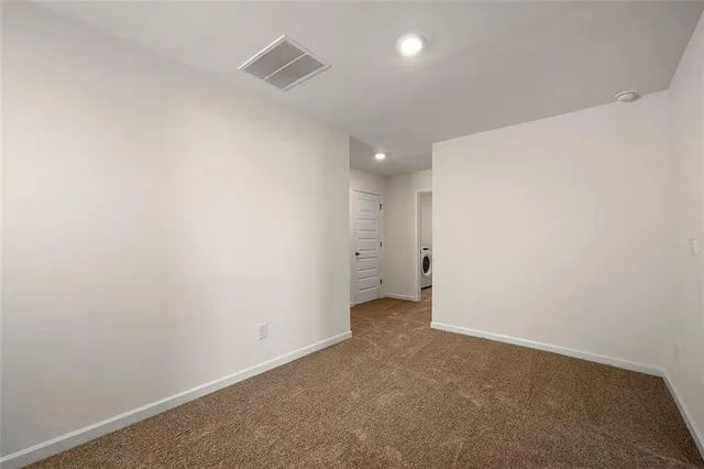 an empty room with an entryway
