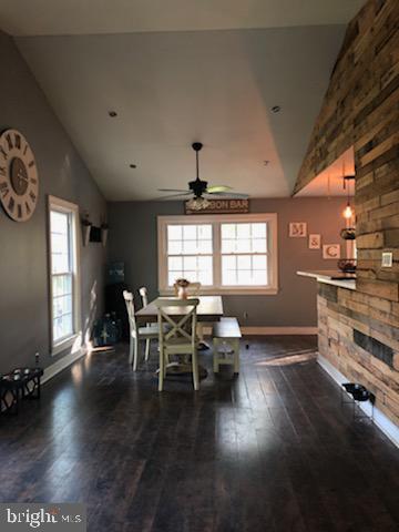 153 Sooy Place Road Tabernacle, NJ 08088 - Photo 7 of 18 a dining room with furniture and wooden floor