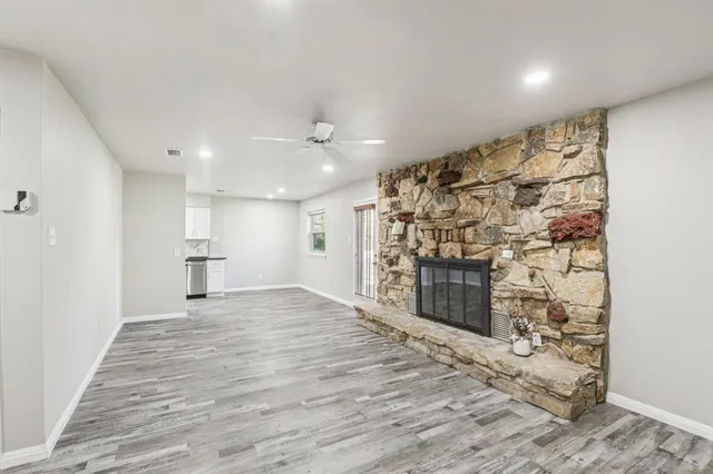 a view of a livingroom with a fireplace