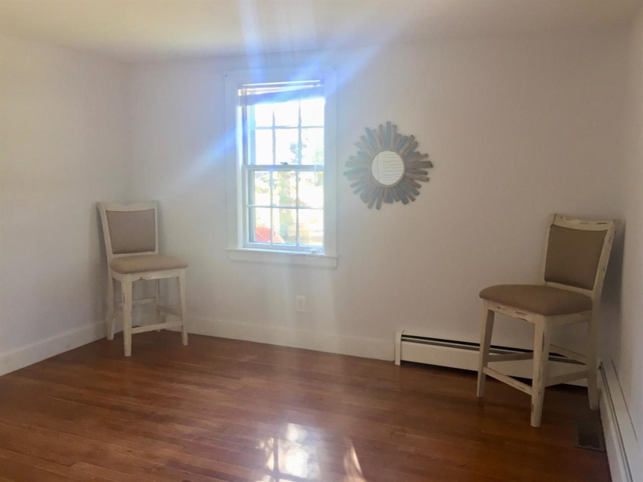 133 Old Town Road Hyannis, MA 02601 - Photo 9 of 29 a view of a workspace with furniture and a window
