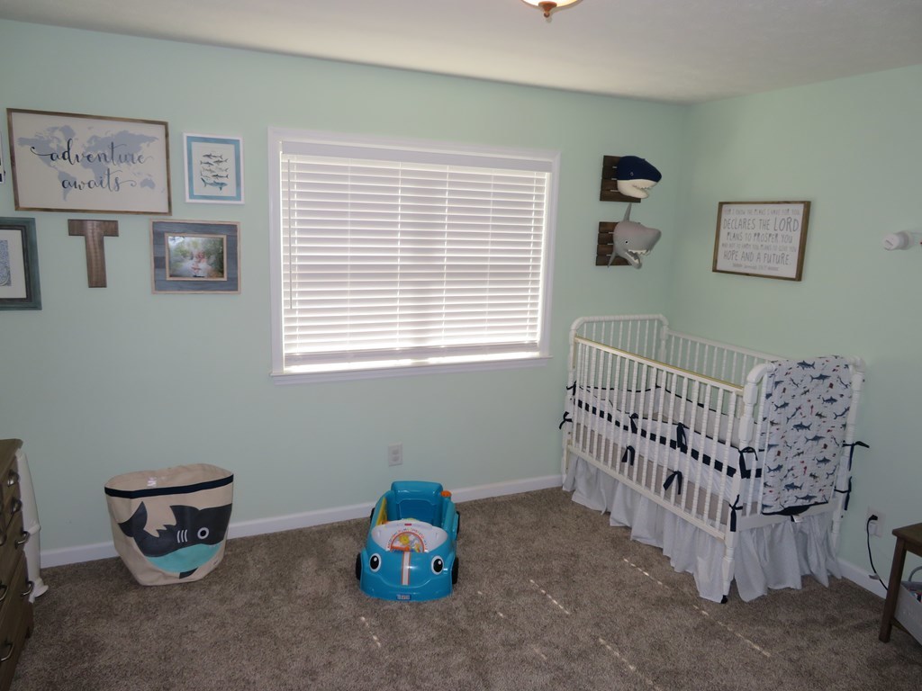 285 Buck Road Gray, GA 31032 - Photo 22 of 36 a view of a room with baby toys