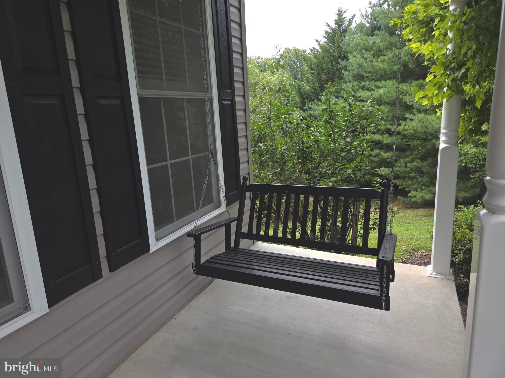 10693 Harding Road Laurel, MD 20723 - Photo 3 of 61 Relax on your front porch swing!