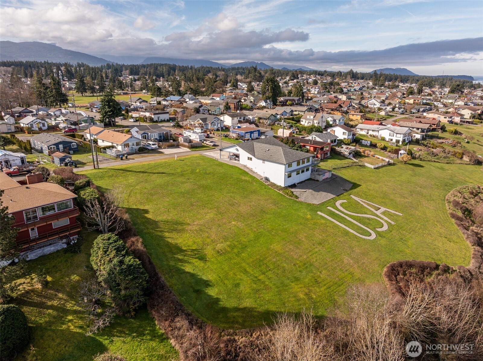 999 West 4th Street Port Angeles, WA 98363 - Photo 12 of 22 a view of a lake with a city