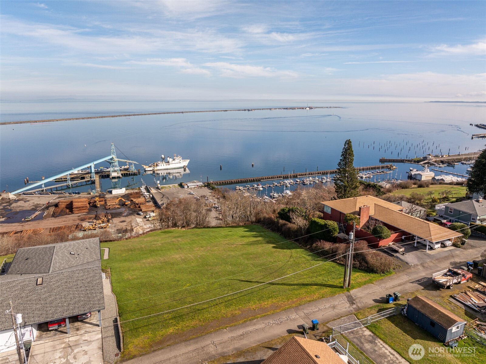 999 West 4th Street Port Angeles, WA 98363 - Photo 16 of 22 a view of a pool with lawn chairs