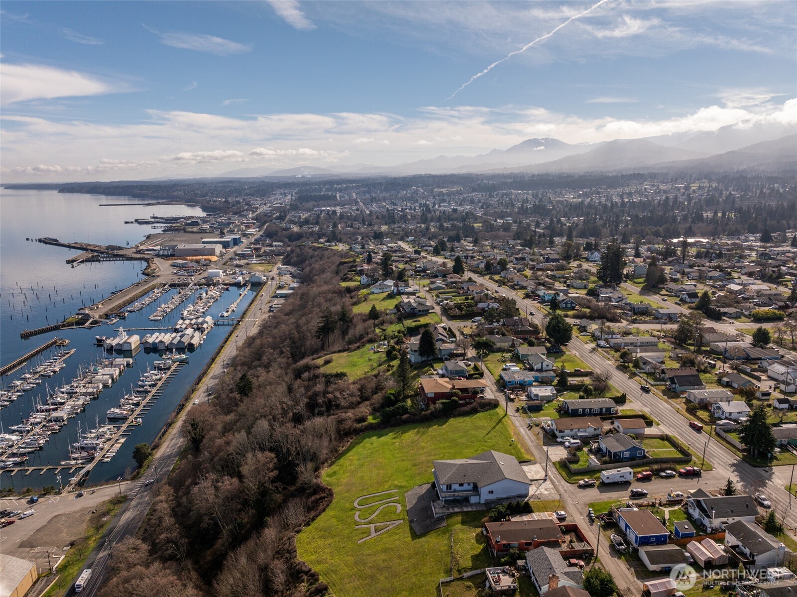 999 West 4th Street Port Angeles, WA 98363 - Photo 6 of 22 an aerial view of residential building with parking space