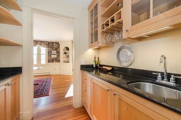 208 Argilla Road Ipswich, MA 01938 - Photo 15 of 30 a kitchen with a sink and a wooden floor