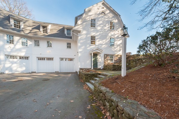 208 Argilla Road Ipswich, MA 01938 - Photo 4 of 30 a view of a large building with many windows