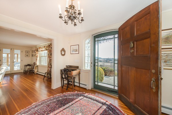 208 Argilla Road Ipswich, MA 01938 - Photo 7 of 30 a living room with furniture and a large window