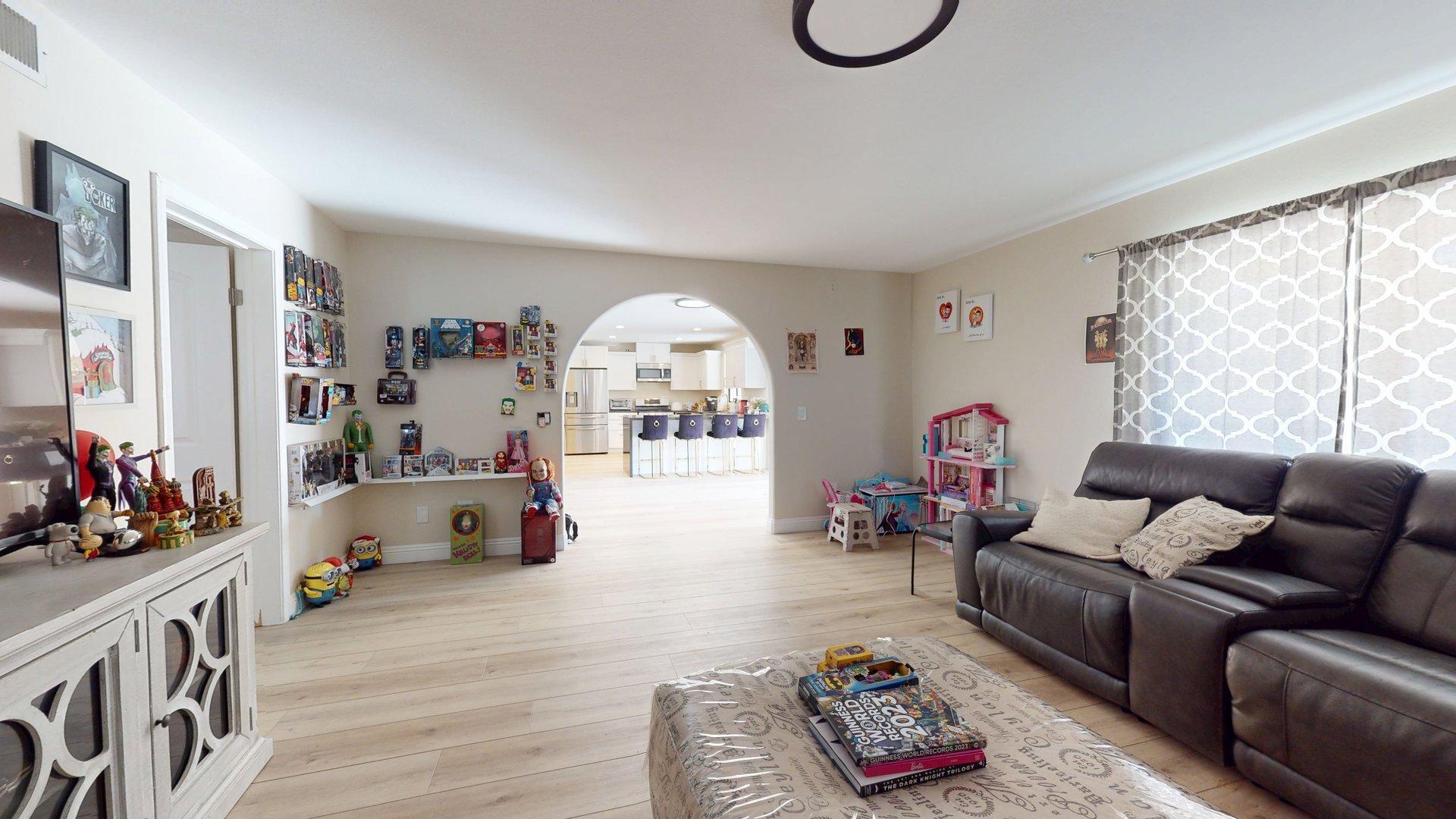 68645 Panorama Road Cathedral City, CA 92234 - Photo 13 of 35 a living room with furniture and a wooden floor