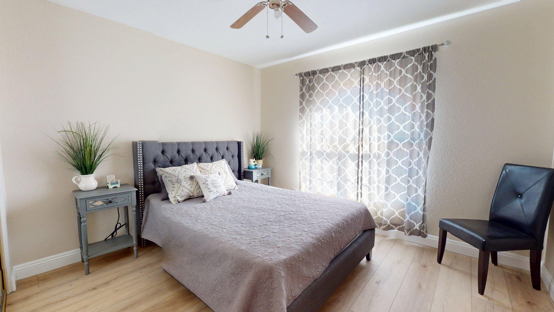 68645 Panorama Road Cathedral City, CA 92234 - Photo 17 of 35 a bedroom with a large bed and a chair