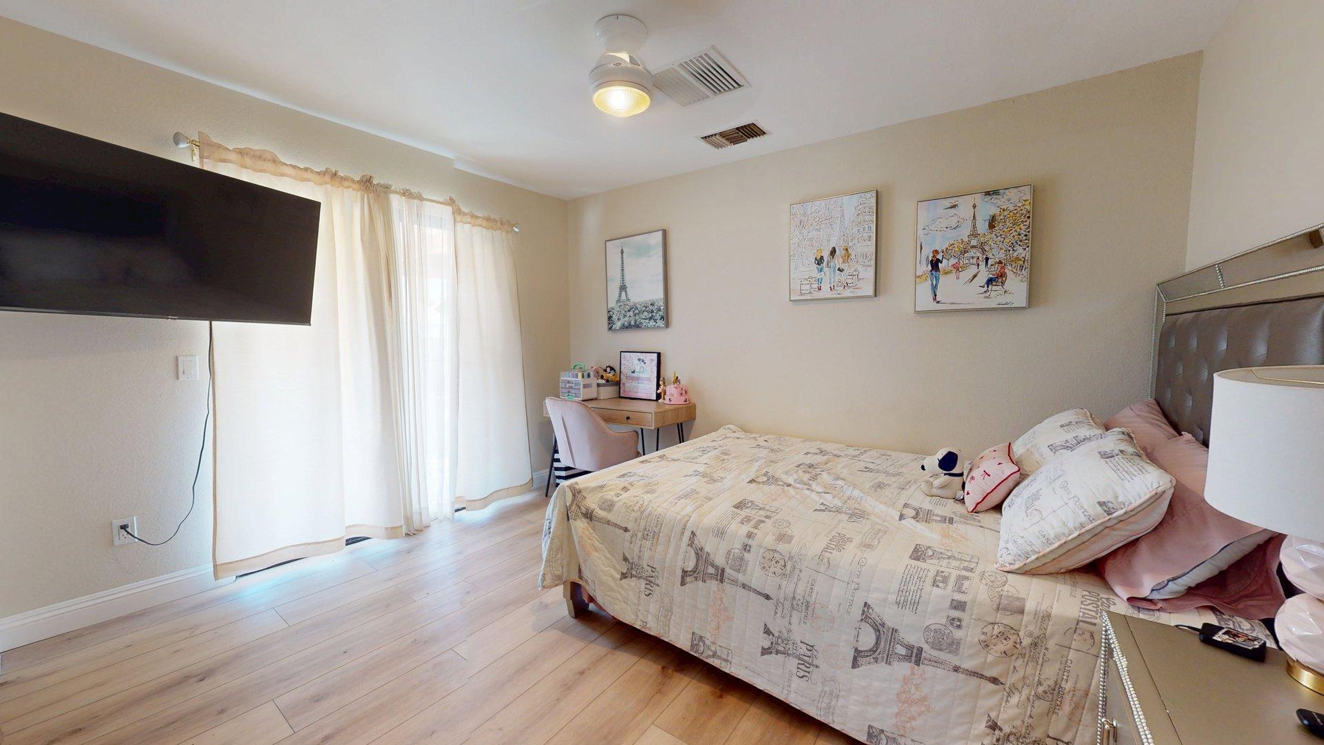 68645 Panorama Road Cathedral City, CA 92234 - Photo 20 of 35 a bedroom with a bed and a flat screen tv