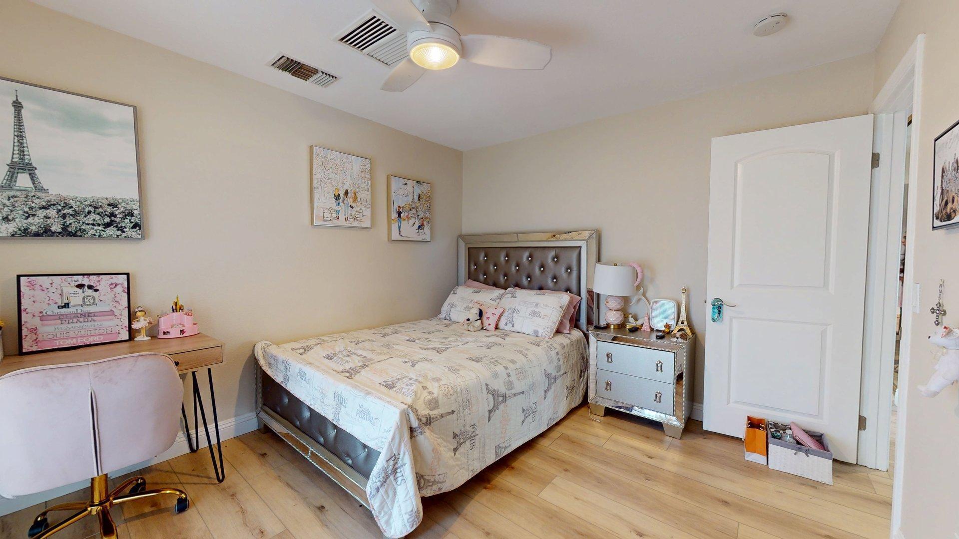 68645 Panorama Road Cathedral City, CA 92234 - Photo 21 of 35 a bedroom with a bed and a table in it