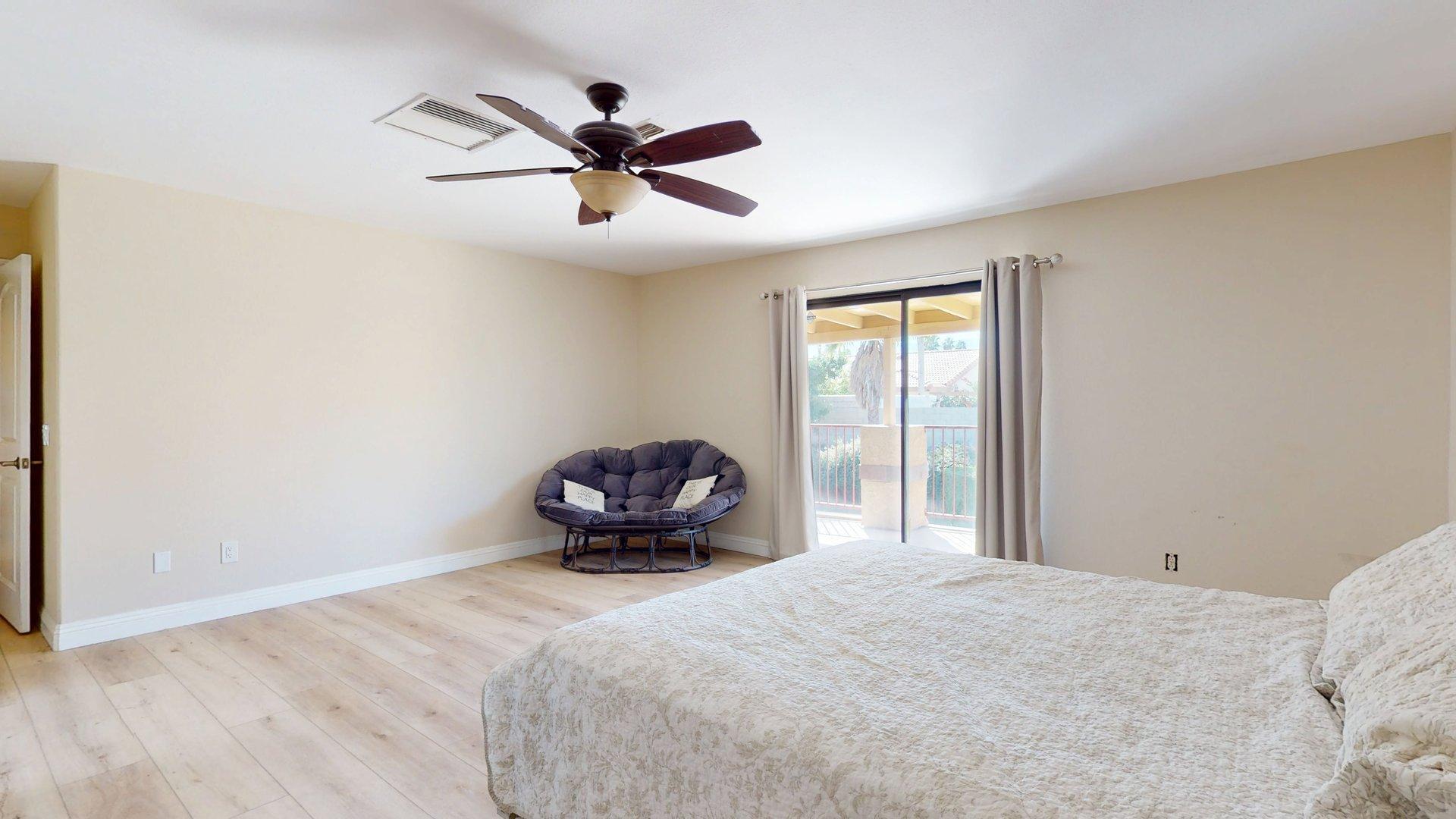 68645 Panorama Road Cathedral City, CA 92234 - Photo 24 of 35 a bedroom with a bed and a window