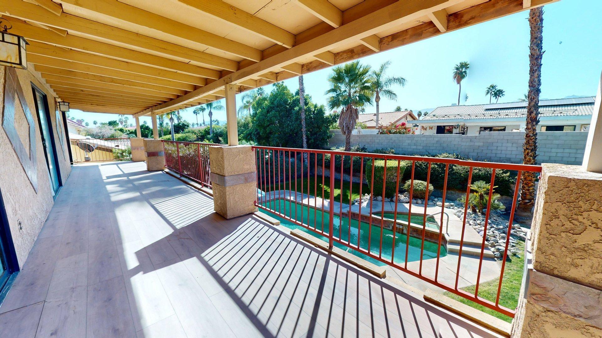 68645 Panorama Road Cathedral City, CA 92234 - Photo 29 of 35 a view of balcony with couch and wooden floor