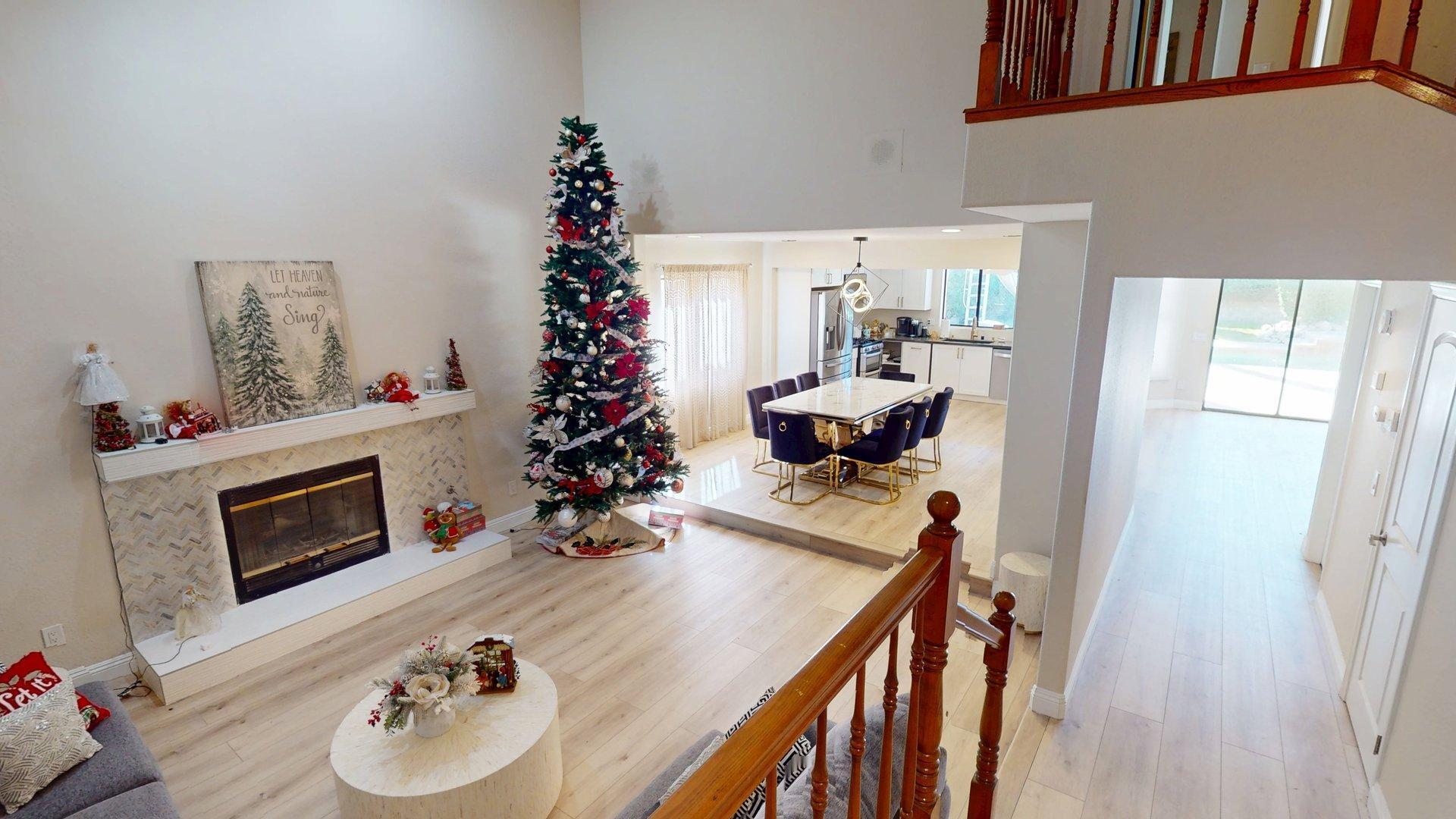 68645 Panorama Road Cathedral City, CA 92234 - Photo 4 of 35 a living room with furniture wooden floor and a fireplace