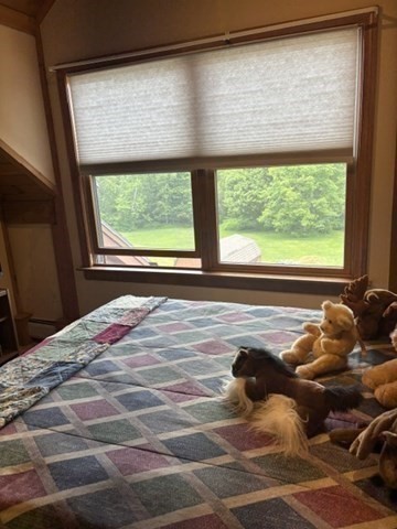 200 Peru Road Windsor, MA 01270 - Photo 33 of 42 a bedroom with a bed and a large window