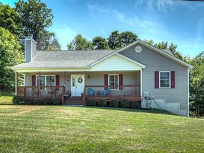 197 Post Road Slate Hill, NY 10973 - Photo 1 of 1 front view of a house with a yard