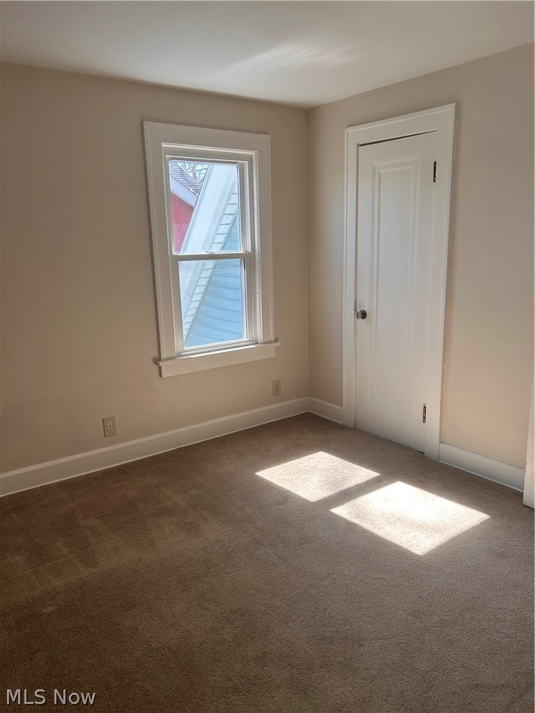 1001 Englewood Road Cleveland Heights, OH 44121 - Photo 17 of 28 Carpeted empty room with baseboards