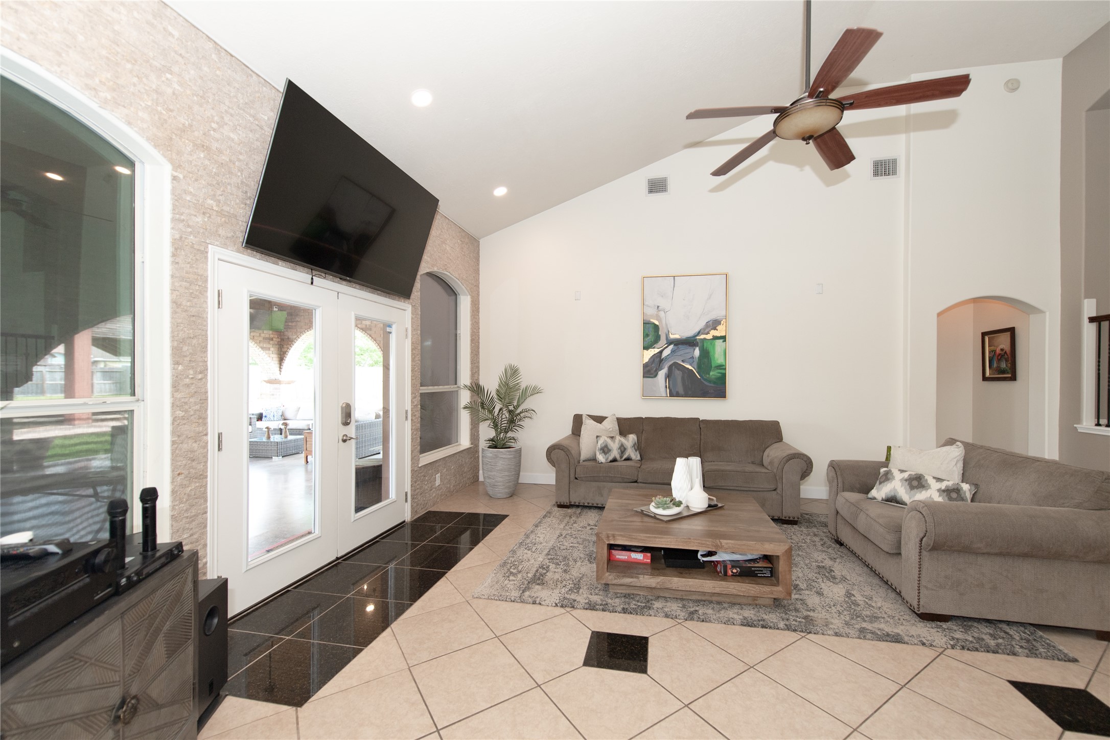 1914 Lakeside Crossing Katy, TX 77494 - Photo 11 of 44 a living room with furniture and a flat screen tv