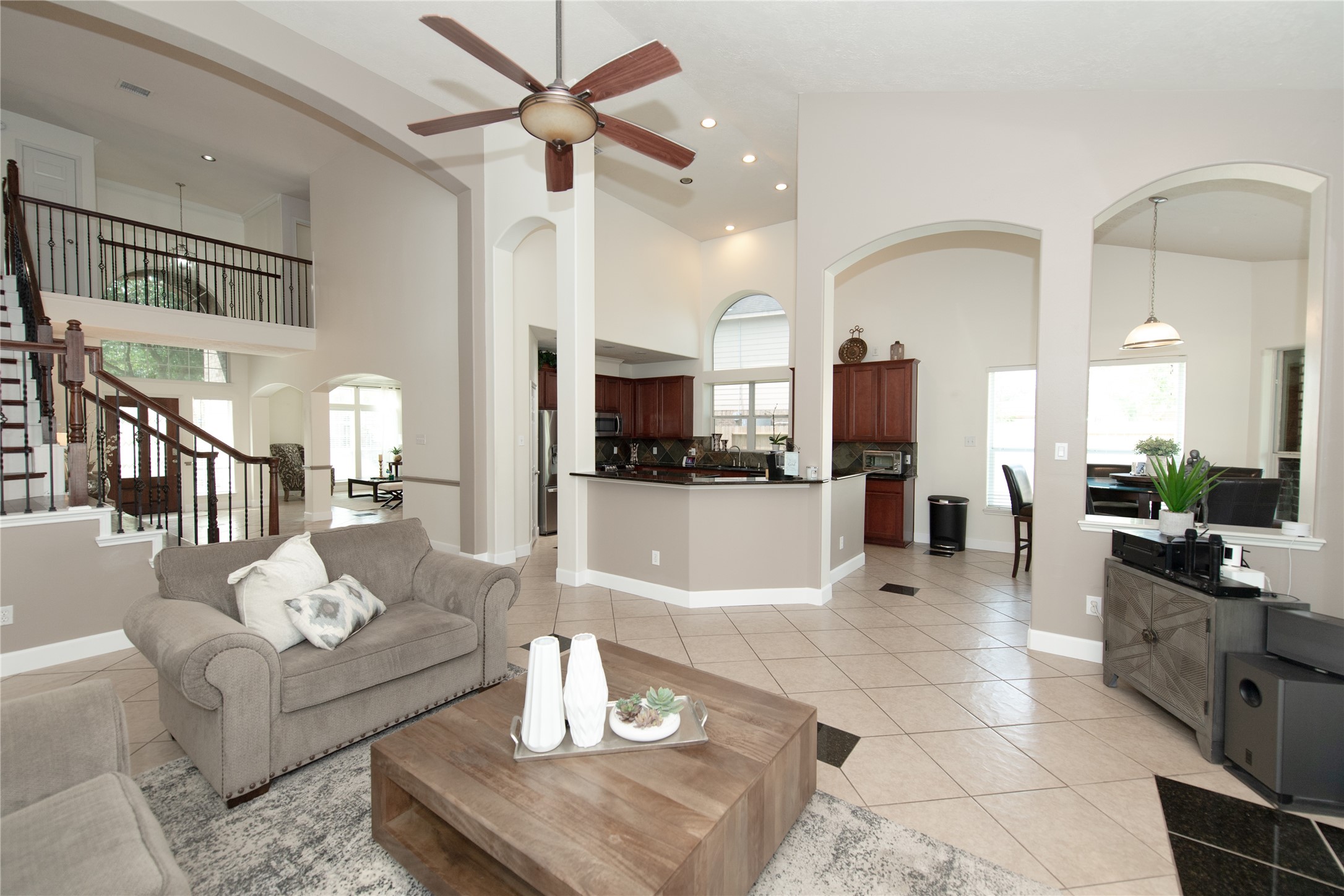 1914 Lakeside Crossing Katy, TX 77494 - Photo 12 of 44 a living room with furniture and view of kitchen