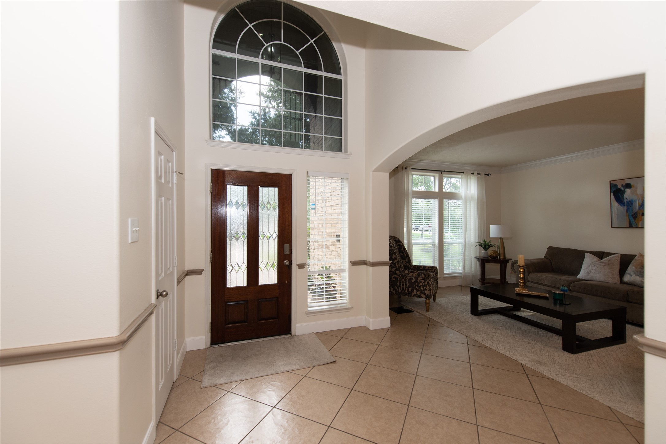 1914 Lakeside Crossing Katy, TX 77494 - Photo 3 of 44 a living room with furniture and a window