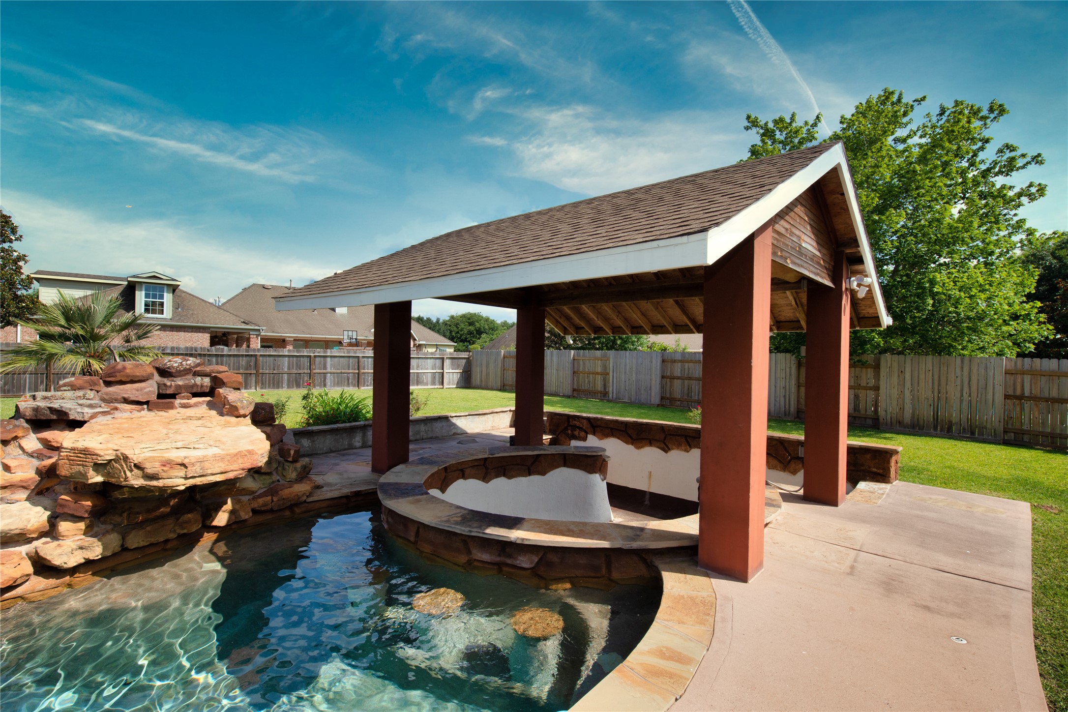 1914 Lakeside Crossing Katy, TX 77494 - Photo 34 of 44 a backyard of a house with yard table and chairs
