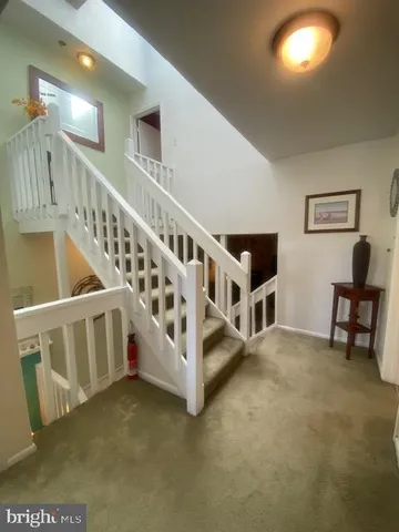 a view of an entryway with a front door