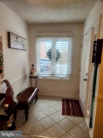 a room with furniture and a window