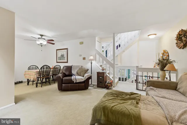 a bedroom with furniture and a chandelier