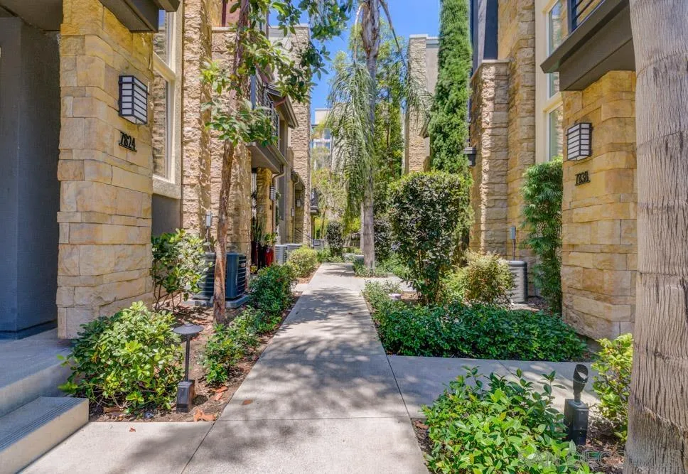 7832 Inception Way San Diego, CA 92108 - Photo 21 of 31 a view of a pathway with house on both side