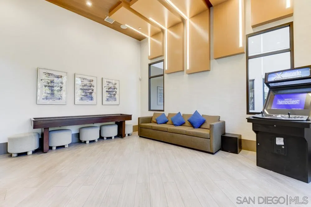 7832 Inception Way San Diego, CA 92108 - Photo 31 of 31 a living room with furniture and a flat screen tv