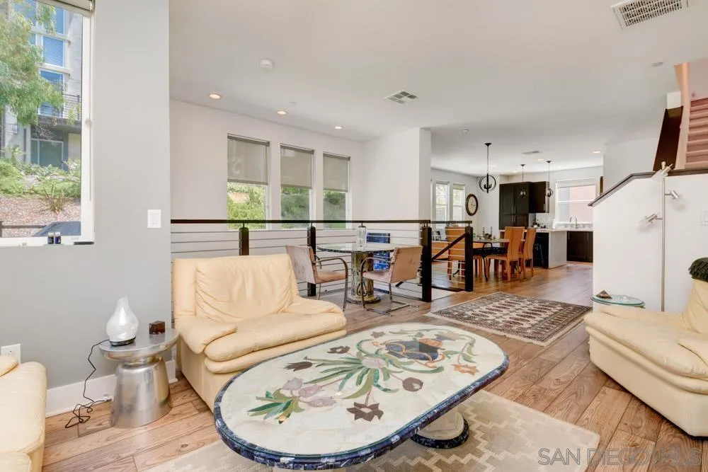 7832 Inception Way San Diego, CA 92108 - Photo 4 of 31 a living room with furniture and a table