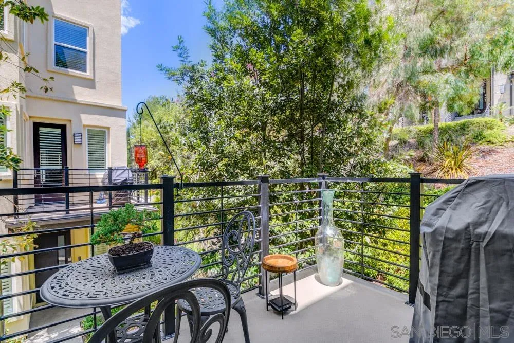 7832 Inception Way San Diego, CA 92108 - Photo 9 of 31 a balcony with table and chairs