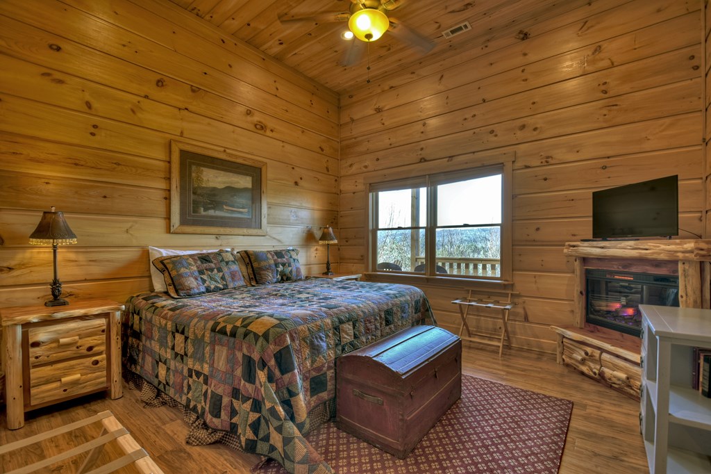 602 Laurel Creek Trail Blue Ridge, GA 30513 - Photo 36 of 53 lower level fireplace and bar