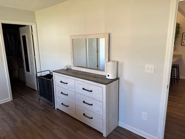 a view of cabinets with wooden floor