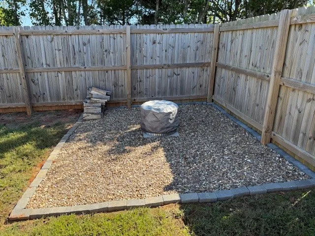 a view of a back yard of the house