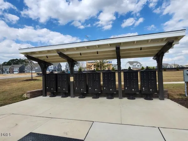 a view of a car park in front of house