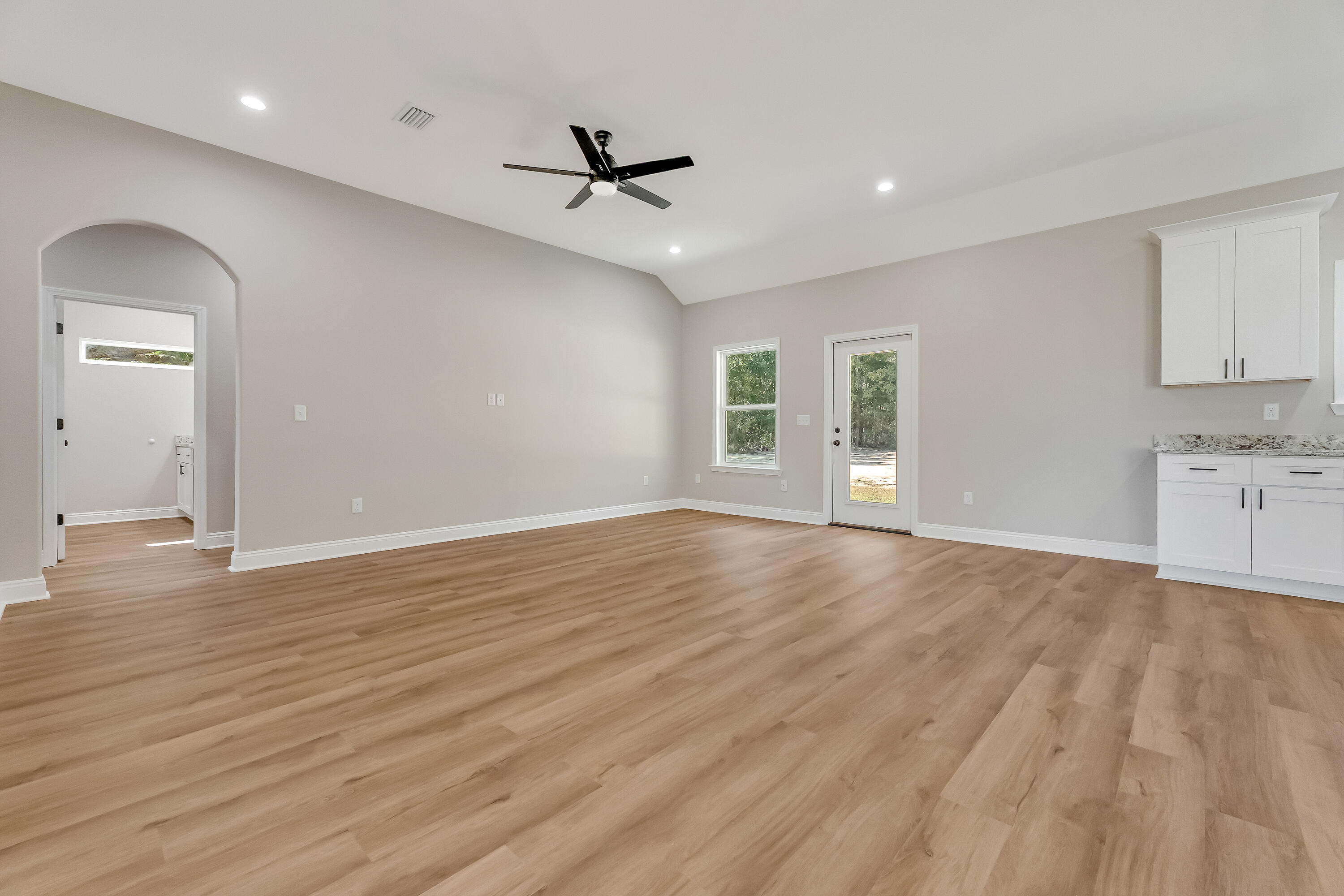 2.93-ac Goodwin Road Crestview, FL 32539 - Photo 18 of 45 a view of empty room with wooden floor and ceiling fan