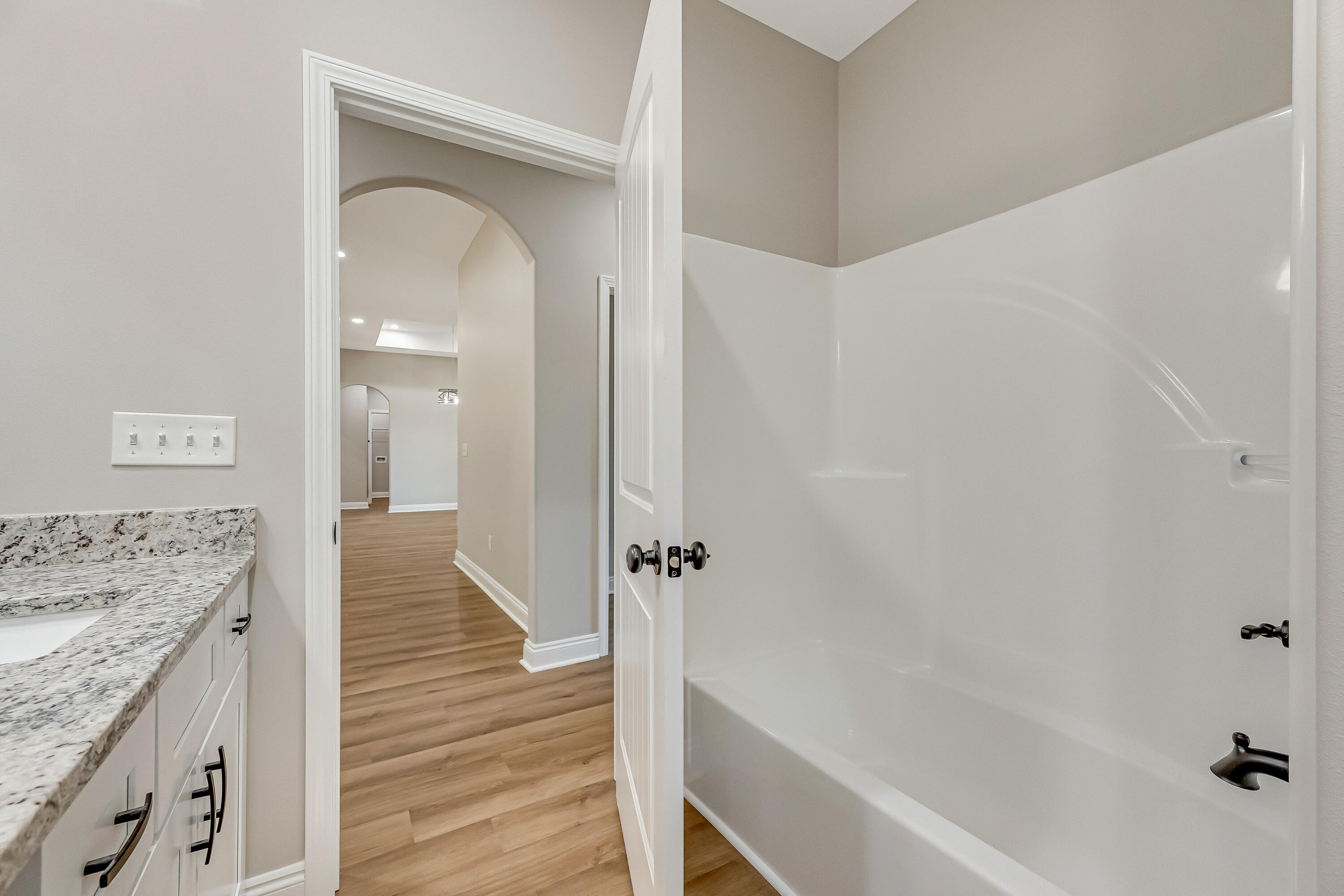 2.93-ac Goodwin Road Crestview, FL 32539 - Photo 39 of 45 a bathroom with a granite countertop sink a mirror and shower