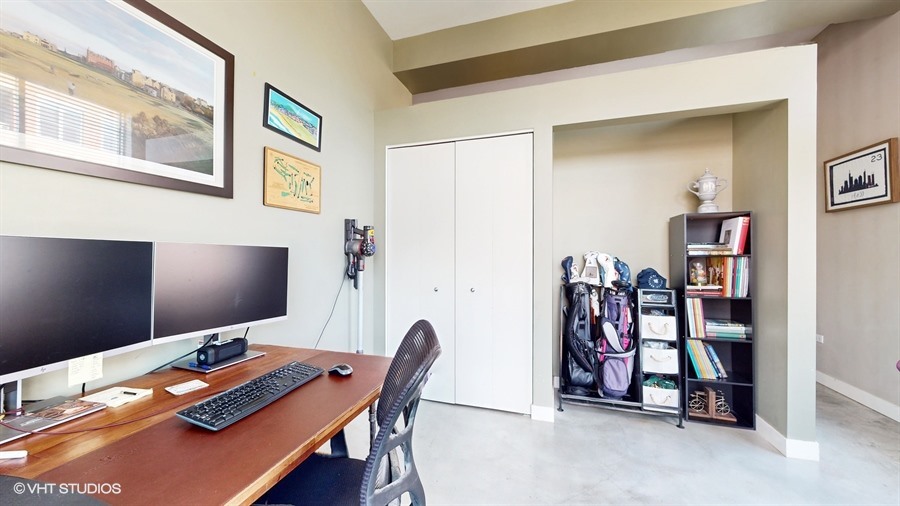 949 West Madison Street, Unit 401 Chicago, IL 60607 - Photo 11 of 14 a view of a workspace with furniture