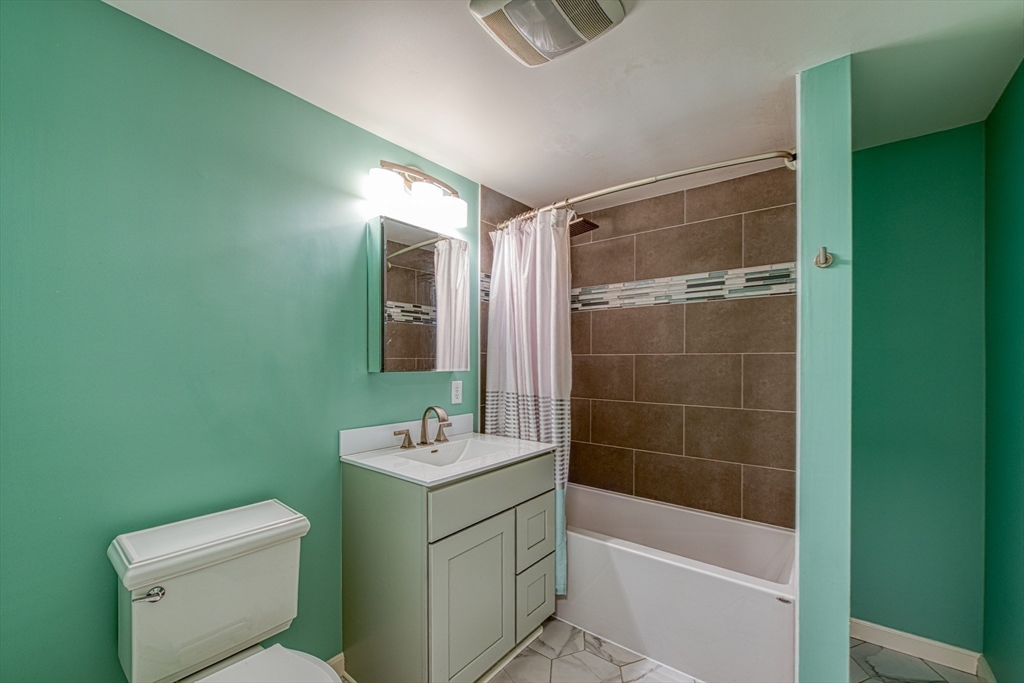38 Cap'n Jac's Road Barnstable, MA 02632 - Photo 14 of 18 a bathroom with a sink toilet and shower
